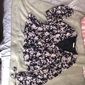 Emerette xl dark blue back ground with light floral design